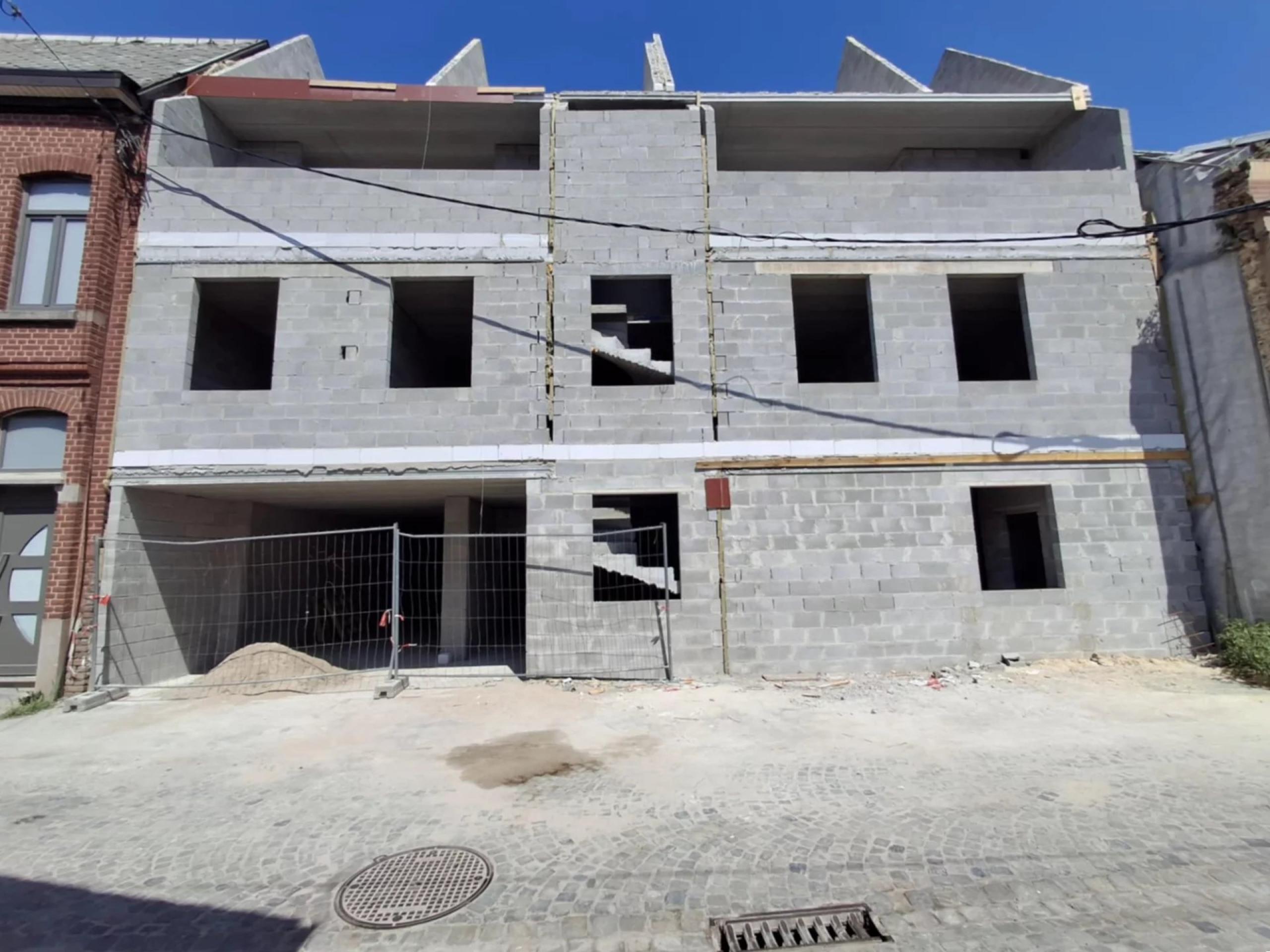 Gros œuvre ouvert de 4 lots, terrasses, et parking