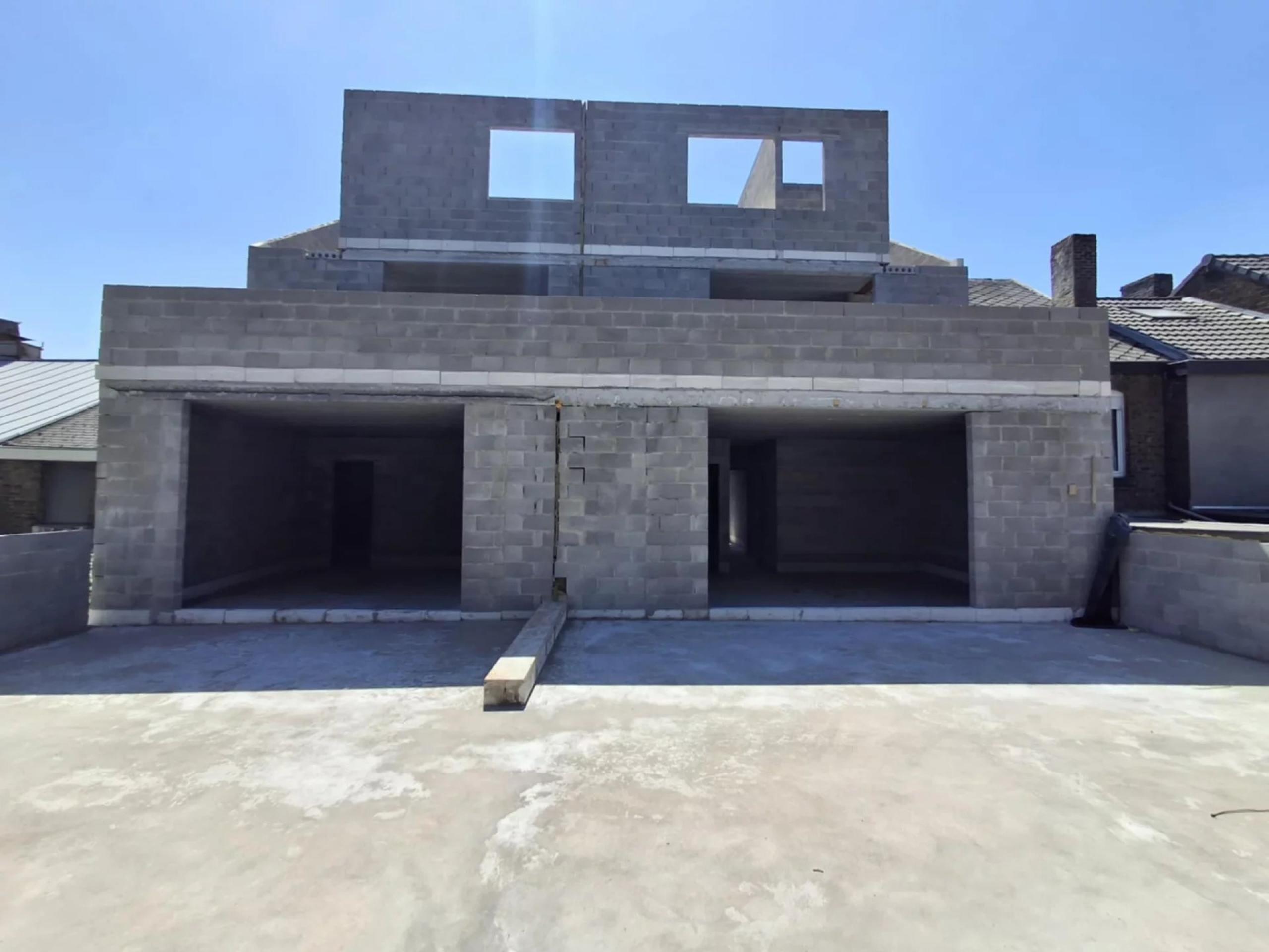 Gros œuvre ouvert de 4 lots, terrasses, et parking