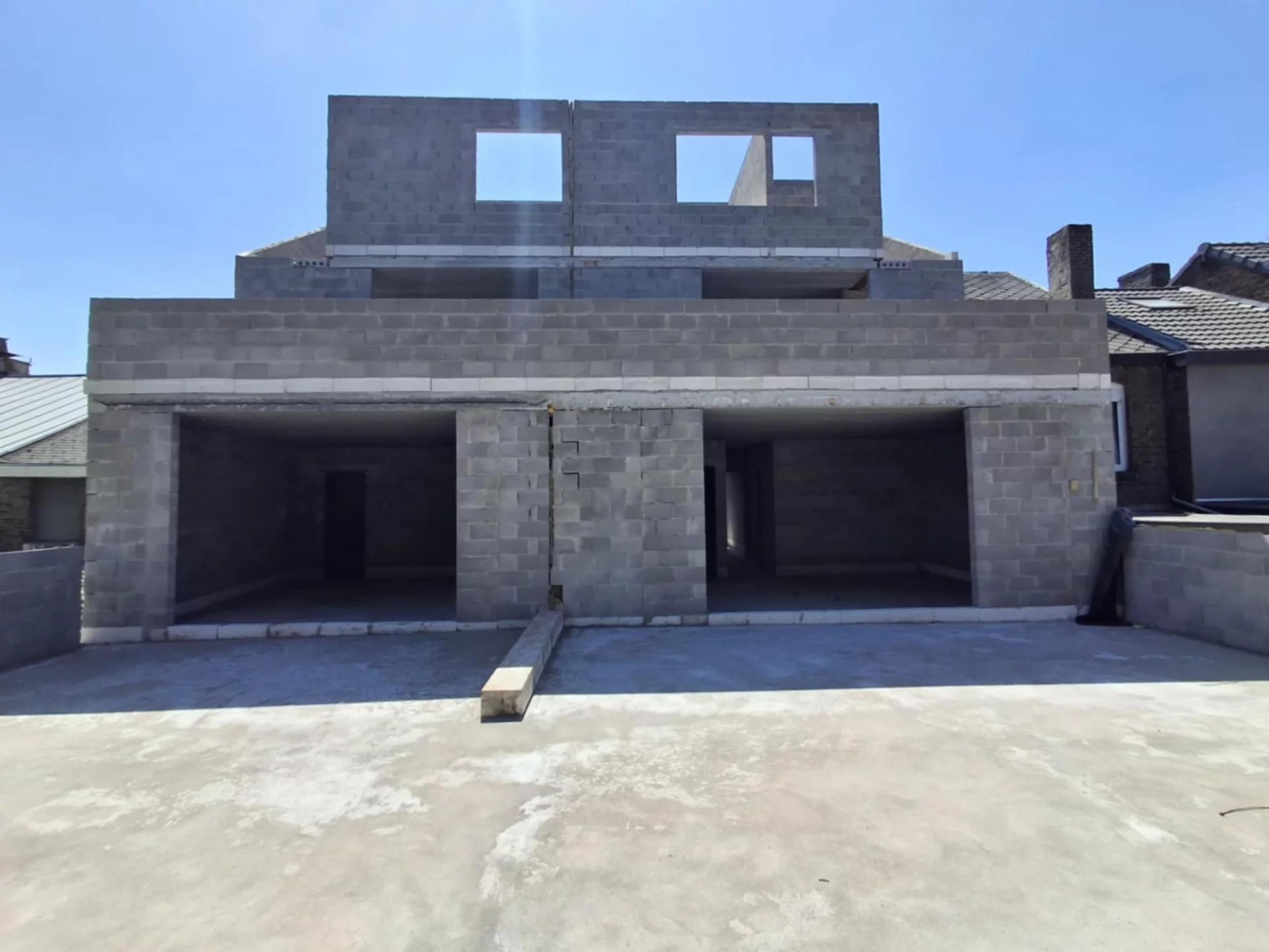 Gros œuvre ouvert de 4 lots, terrasses, et parking