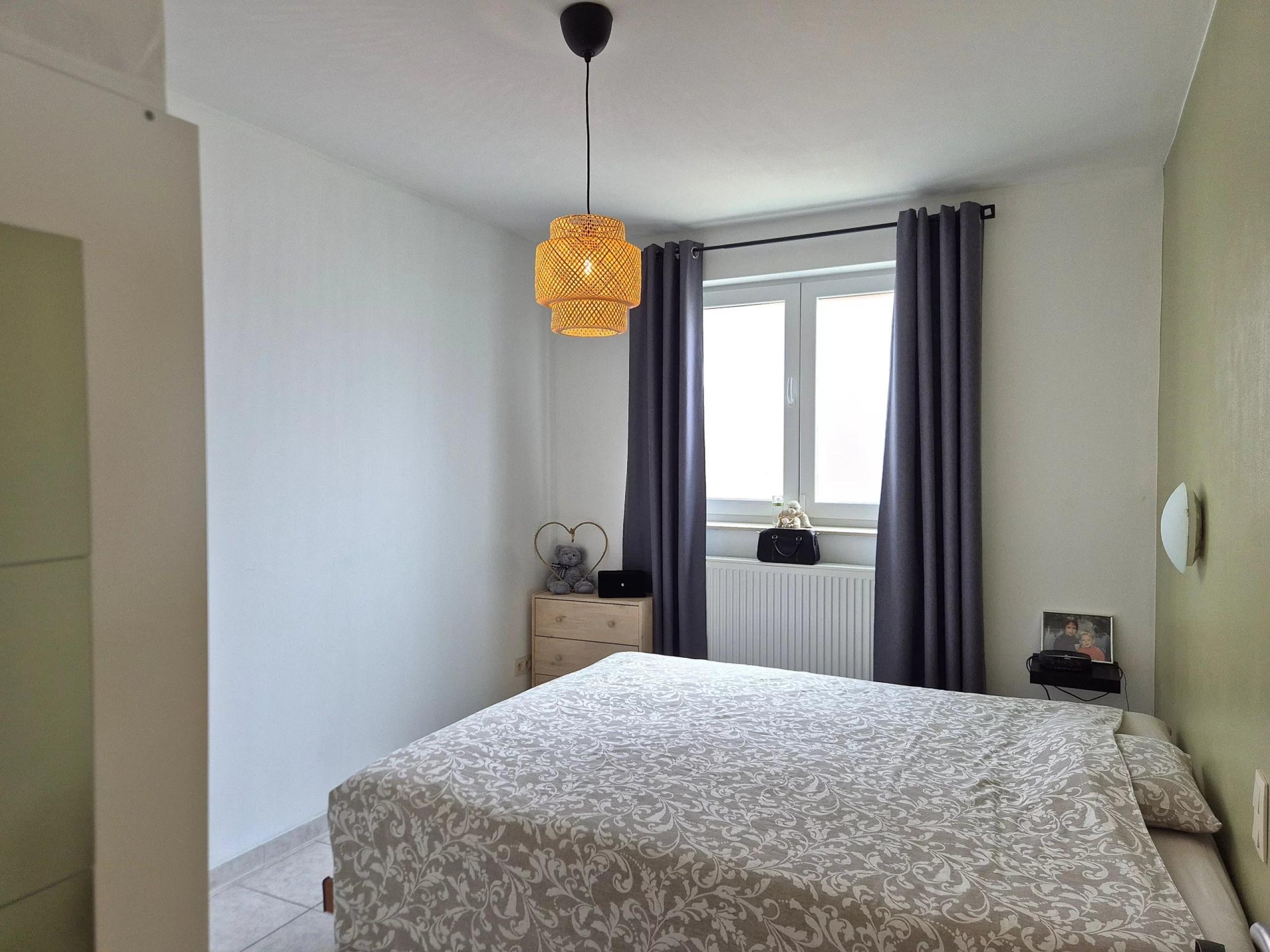 Appartement une chambre, parking et cave