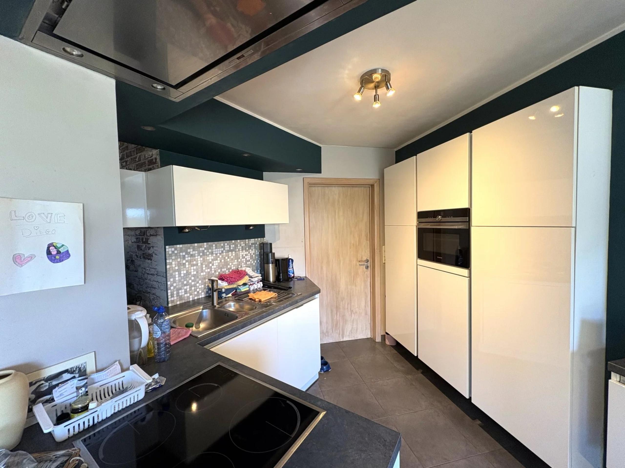 Option ! Agréable  maison 2 chambres, jardin et garage