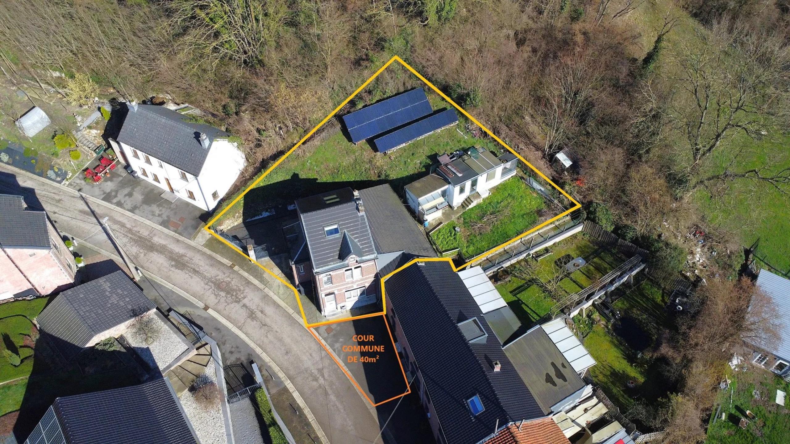 WONCK: Maison 4 chambres avec remise, cour et jardin