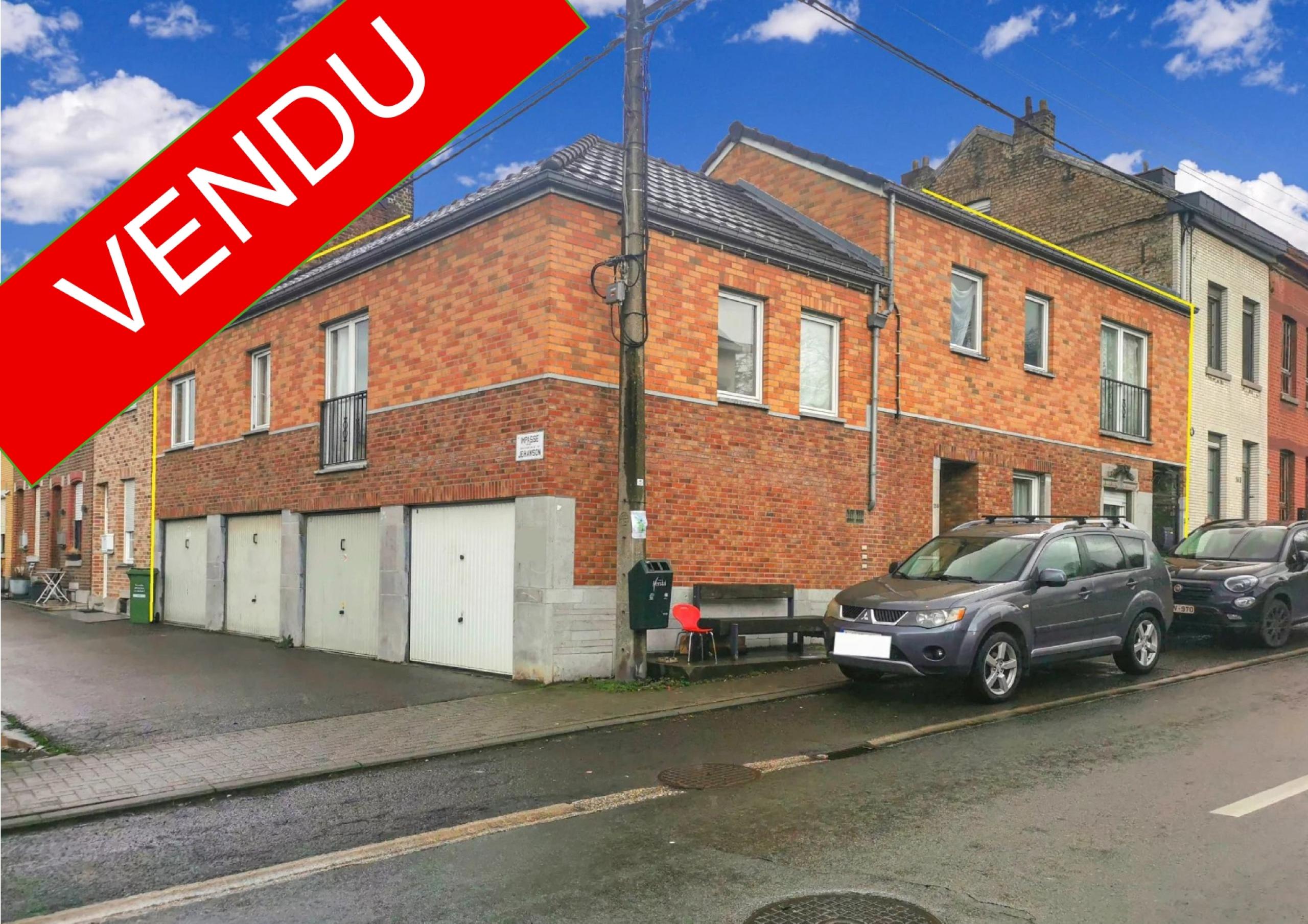 VENDU ! Spacieux immeuble à 3 appartements et 4 garages