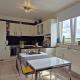 Appartement une chambre, parking et cave