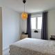 Appartement une chambre, parking et cave