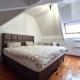 HOUTAIN : Ensemble Commerce + 3 appartements et terrasses