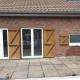 HOUTAIN : Ensemble Commerce + 3 appartements et terrasses