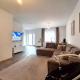 HOUTAIN : Ensemble Commerce + 3 appartements et terrasses