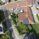 HOUTAIN : Ensemble immobilier: Maison 4ch avec jardin, surface commerciale, 3 appartements, terrain.