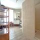 HOUTAIN : Ensemble immobilier: Maison 4ch avec jardin, surface commerciale, 3 appartements, terrain.