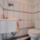 HOUTAIN : Ensemble immobilier: Maison 4ch avec jardin, surface commerciale, 3 appartements, terrain.