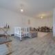 HOUTAIN : Ensemble immobilier: Maison 4ch avec jardin, surface commerciale, 3 appartements, terrain.