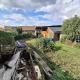 HOUTAIN : Ensemble immobilier: Maison 4ch avec jardin, surface commerciale, 3 appartements, terrain.