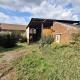 HOUTAIN : Ensemble immobilier: Maison 4ch avec jardin, surface commerciale, 3 appartements, terrain.
