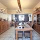 HOUTAIN : Ensemble immobilier: Maison 4ch avec jardin, surface commerciale, 3 appartements, terrain.