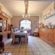 HOUTAIN : Ensemble immobilier: Maison 4ch avec jardin, surface commerciale, 3 appartements, terrain.