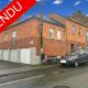 VENDU ! Spacieux immeuble à 3 appartements et 4 garages