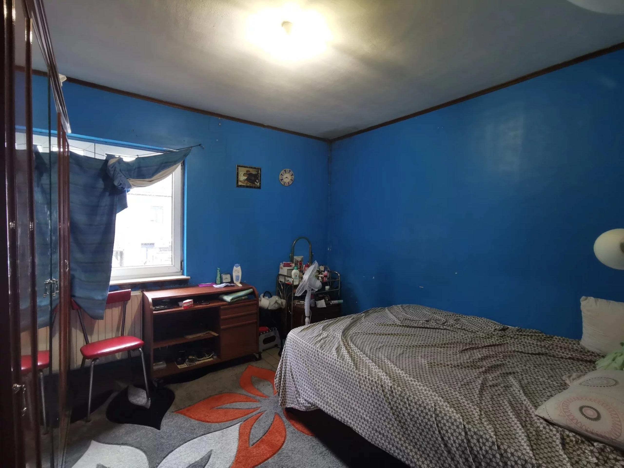 VENDU ! Spacieux immeuble à 3 appartements et 4 garages
