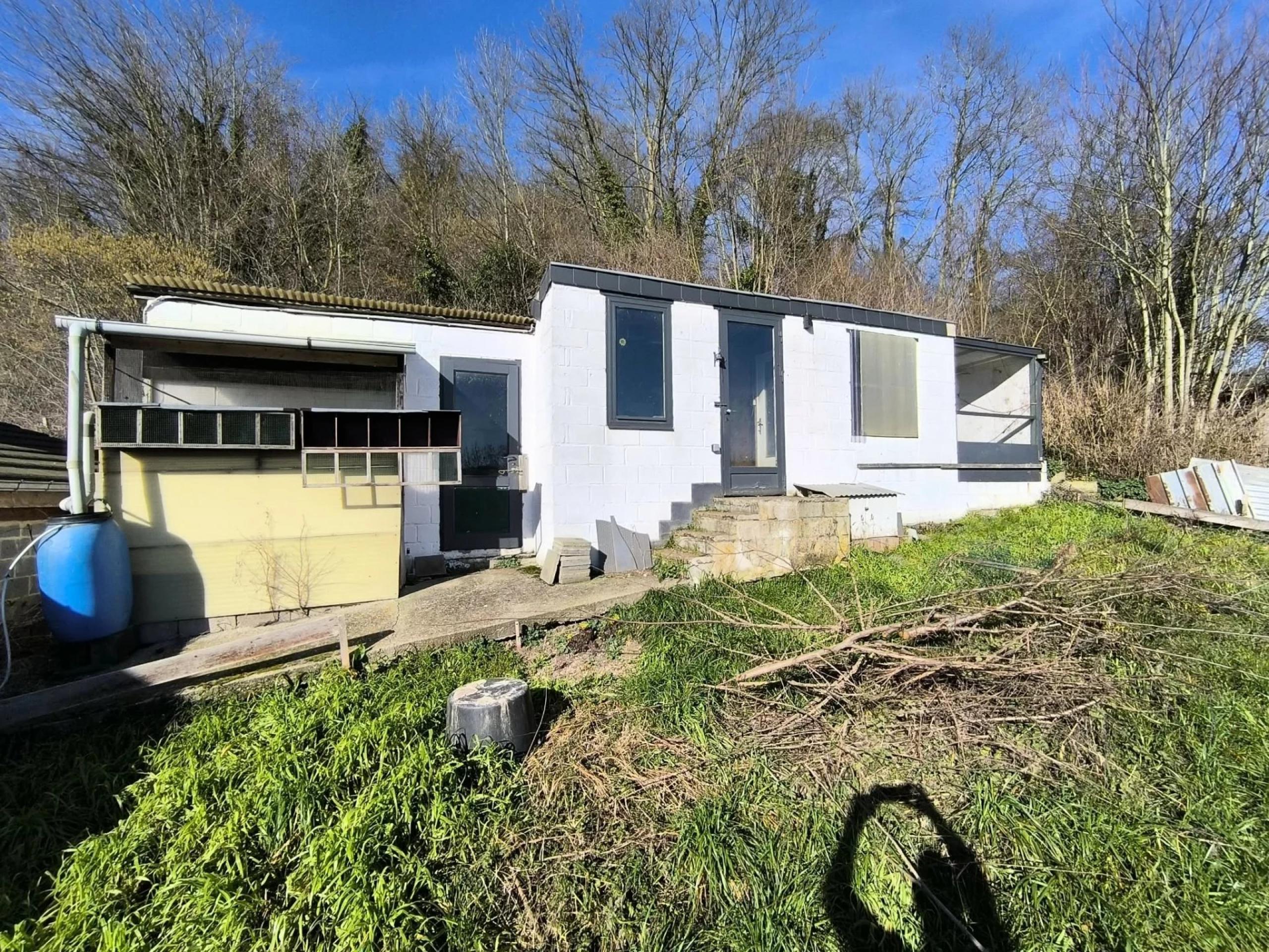 WONCK: Maison 4 chambres avec remise, cour et jardin