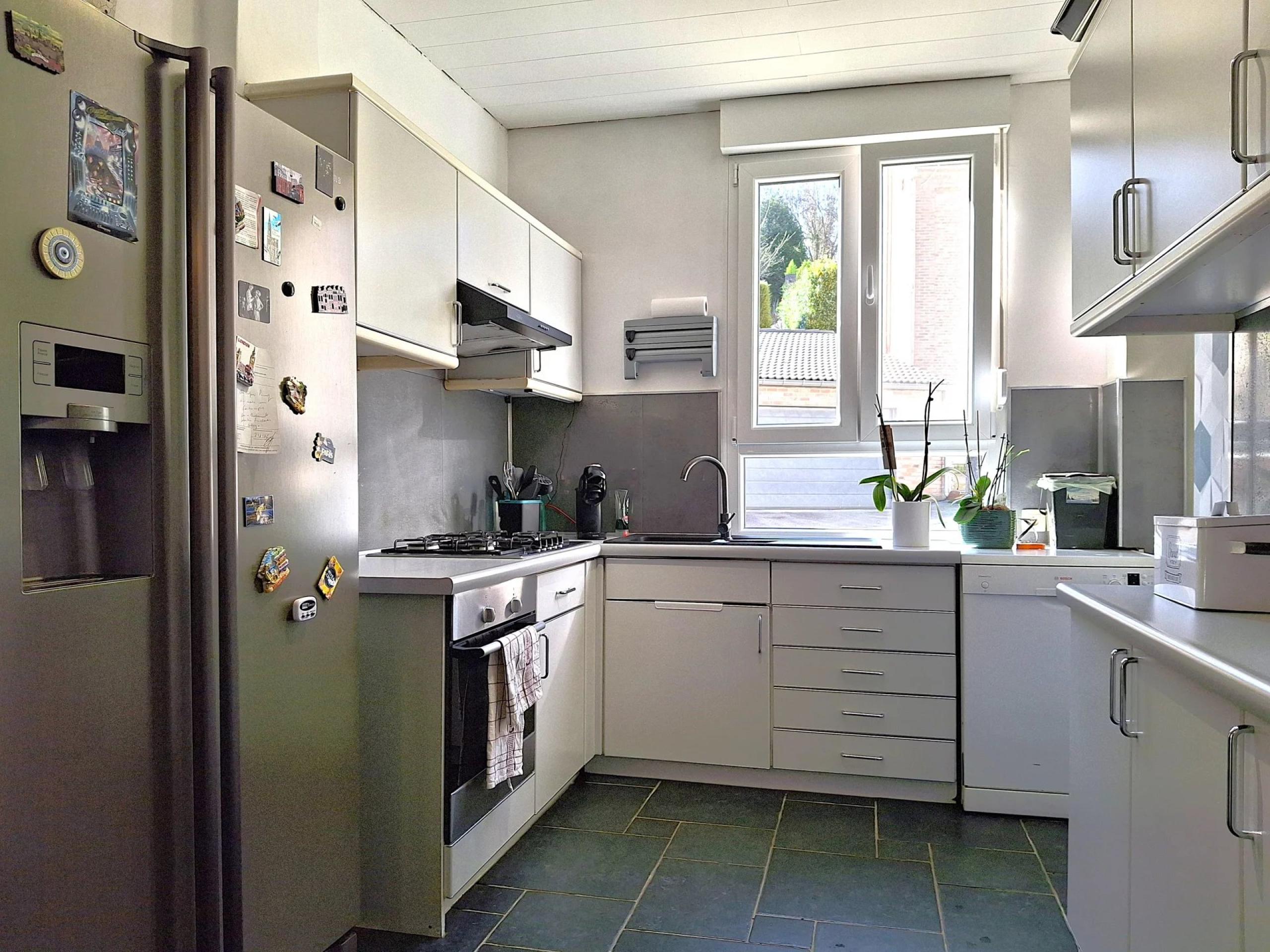 WONCK: Maison 4 chambres avec remise, cour et jardin