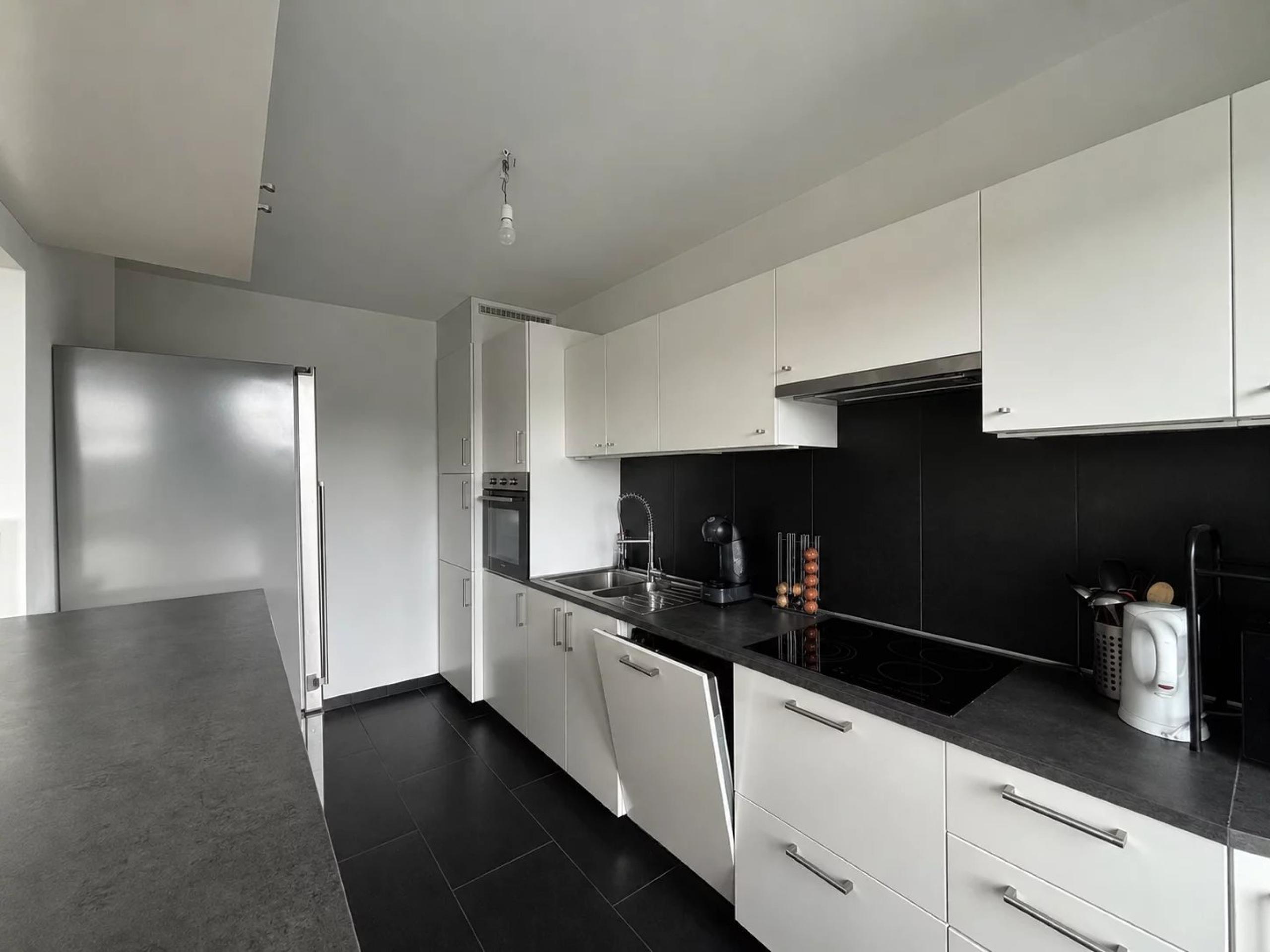 Magnifique appartement dans le quartier Saint-Léonard. en bord de Meuse. 3 chambres. 2 balcons et cave