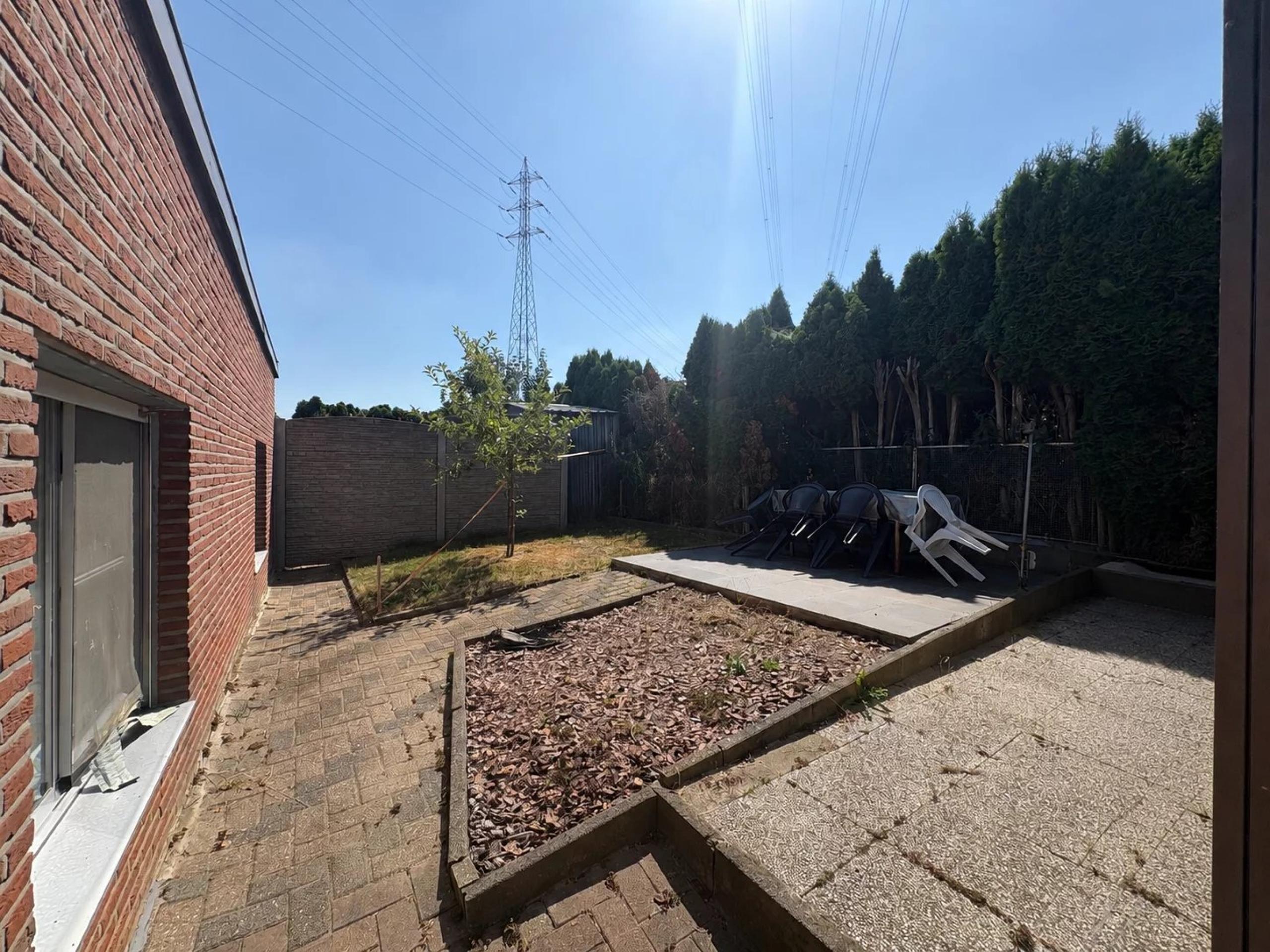 Ensemble immobilier composé d'une maison et d'un appartement