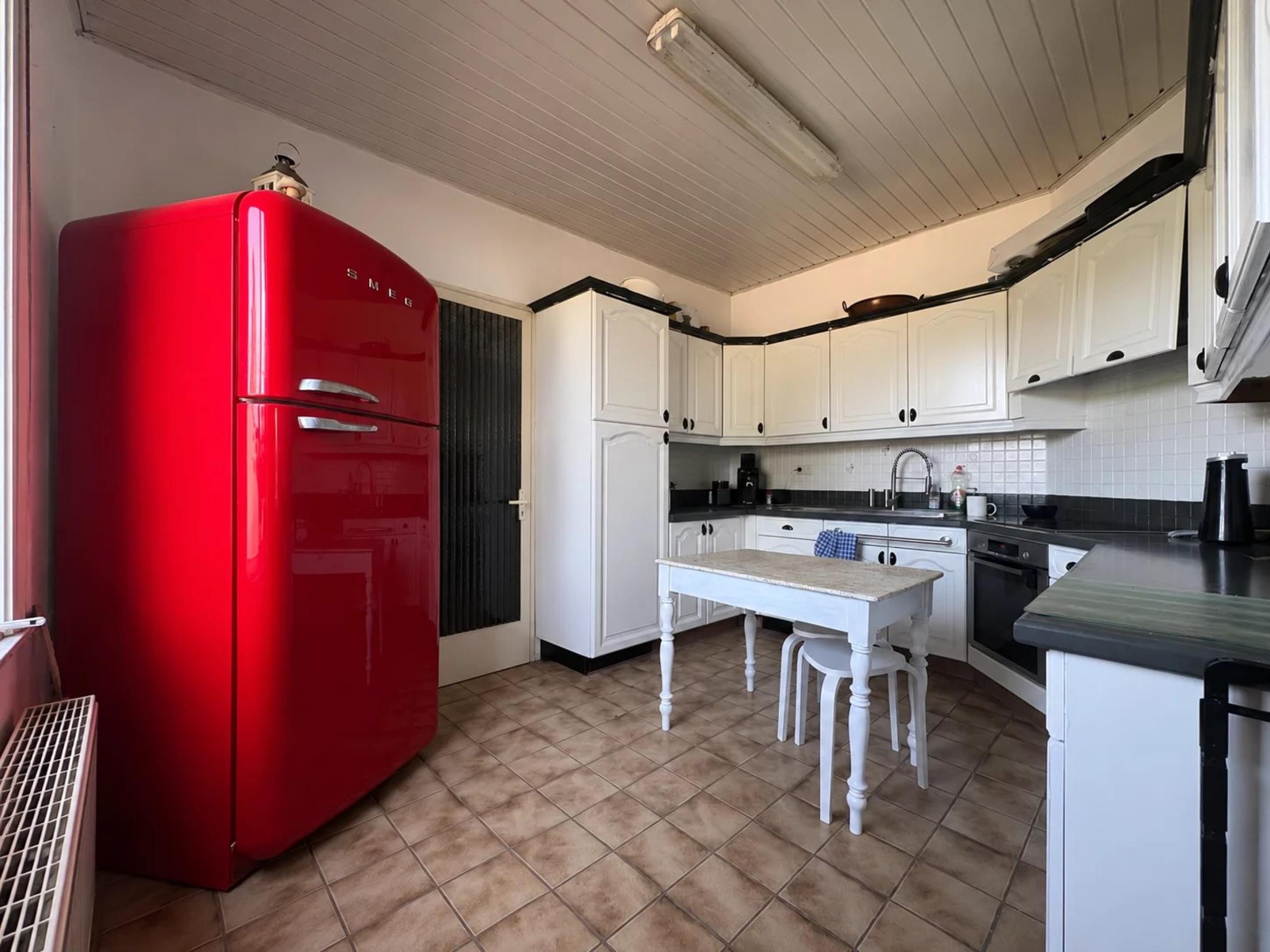 Ensemble immobilier composé d'une maison et d'un appartement