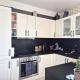 Appartement une chambre, parking et cave