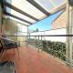 GLONS: Bungalow 2 chambres avec bureau, garage, jardin et terrain
