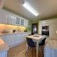 GLONS: Bungalow 2 chambres avec bureau, garage, jardin et terrain