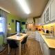 GLONS: Bungalow 2 chambres avec bureau, garage, jardin et terrain
