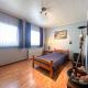 GLONS: Bungalow 2 chambres avec bureau, garage, jardin et terrain
